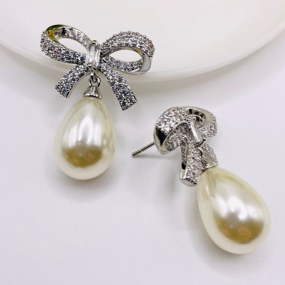 Anthro Shashi Pave Pearl Bow Earrings - Picture 3 of 6